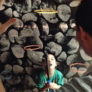 Children levitate objects in the Wizards Tower at The Rhelm.