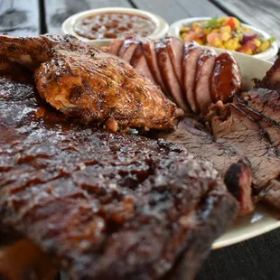 Slow smoked meats and fresh made sides daily.