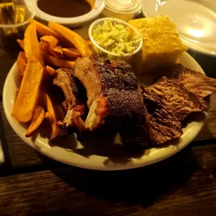 The Brisket and Baby with fries, coleslaw, and cornbread.