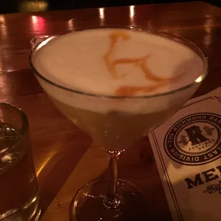 Czech Mate: rum, lemon, becherovka, egg white, simple