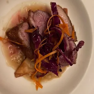 Duck breast on top of Duck dumpling