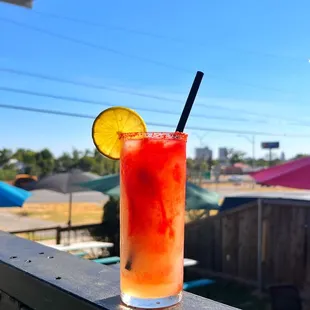 a drink with a slice of lemon