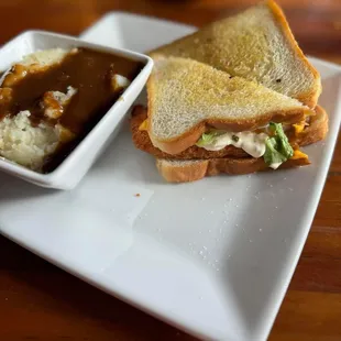Cod sandwich with mashed potatoes and gravy