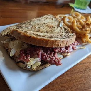 a corned beef sandwich and french fries