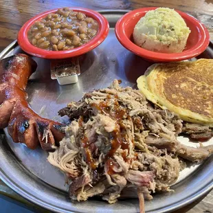 Two Meat Plate with pulled pork and sausage, sides of potato salad and baked beans