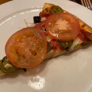 The slice with the bad tomatoes. Surprised they were willing to serve them.