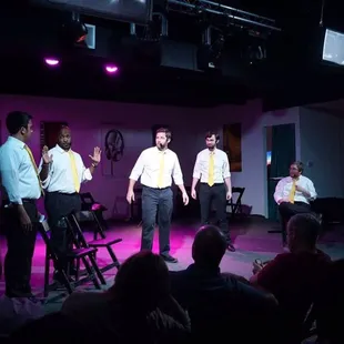 a group of men singing
