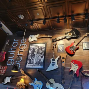 Wall of musical instruments. All cool, some quirky!