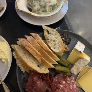 Raclette potatoes and a cheese and charcuterie
