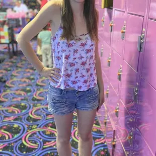 Wearing roller skates on their retro carpet right before gliding on the rink!