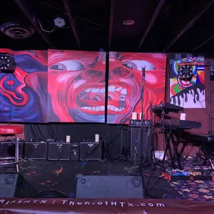 a stage with a painting of a clown