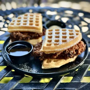 crispy fried chicken, buttermilk waffle,  sprinkle of powdered sugar, side of maple syrup