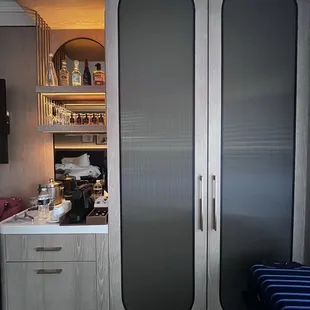 Minibar with coffee and closet