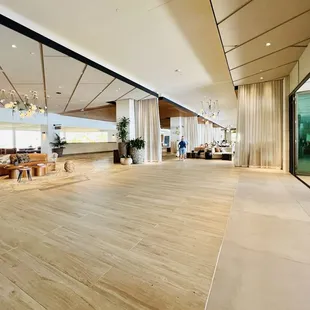 Lobby area. Glass wall folds back to allow fresh air to flow through.