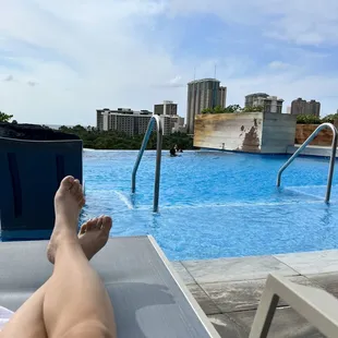 Day time by the family pool