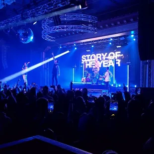 a band performing on stage
