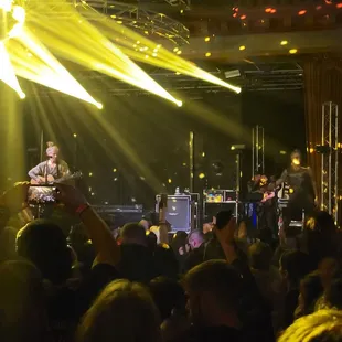 a band performing on stage