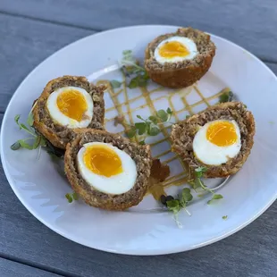 a plate of scotch eggs