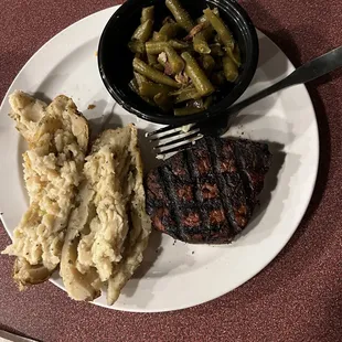 Overcooked 6oz filet, nasty twice-baked potato, green beans