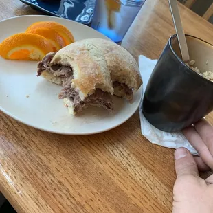 Prime rib w/ orange slices &amp; apricot nutmeg hot oats w/ chocolate truffle