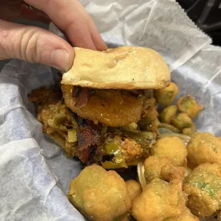 They always make me a mini burger because they&apos;re huge and they know I can&apos;t eat them all. This is a mini cowboy with fried okra.