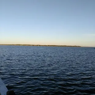 Deck at river house during sunset