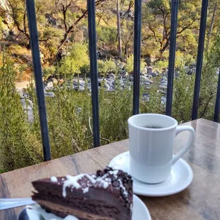 Chocolate cake with coffee with the Merced River behind