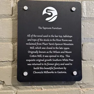 a plaque on the wall