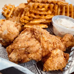 Fried chicken ($8) leg and thigh, waffle fries and slaw.