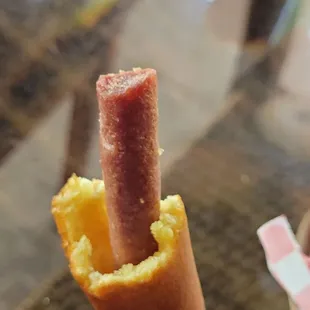 Corn dog aka unflavored battered slim jim. You can hurt someone with this.