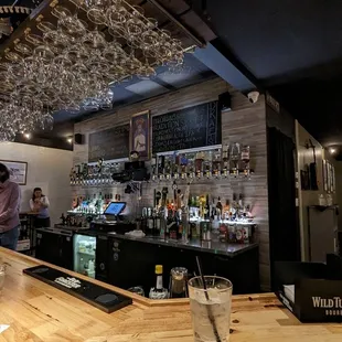 a man standing at the bar