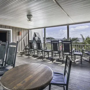 Enjoy the waterfront view in rockers on the 2nd floor breezeway.