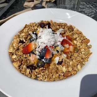 Custom bowl with yogurt, fresh fruit, coconut, original granola and honey drizzle