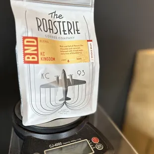 a bag of coffee on a scale