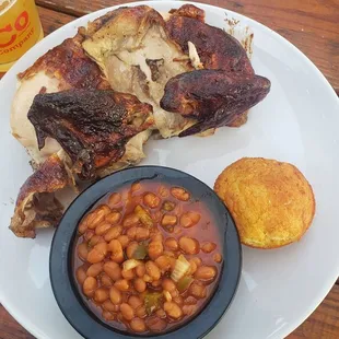 Half Chicken (white) with one side of baked beans.