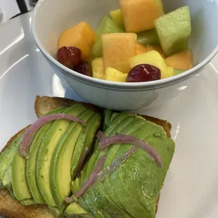Avocado toast with side fruit