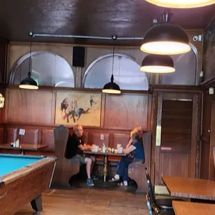 Pool table and part of the indoor dining at the Rock Inn.