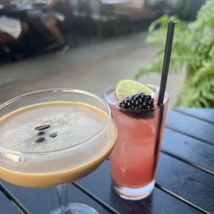 two cocktails on a table