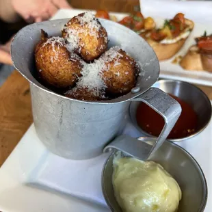 Tater Tots-- filled with pepper jack cheese, served with ketchup &amp; garlic aioli. Delicious! Perfect bite-sized app.