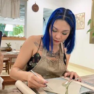 Chi L.