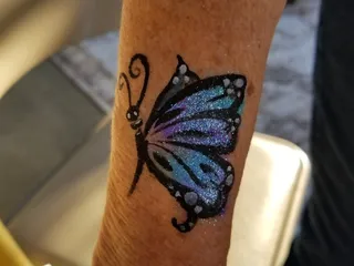 Patty's Happy Face Painting