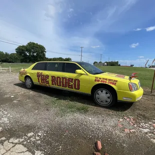 Turn at the yellow limo.