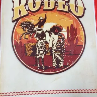 a man riding a horse in the desert