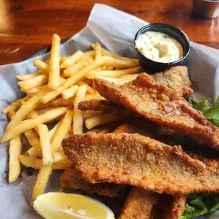 a basket of fish and fries