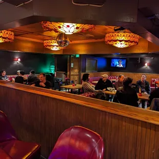 people sitting at the bar