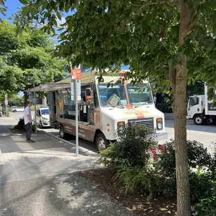 a food truck parked on the side of the road