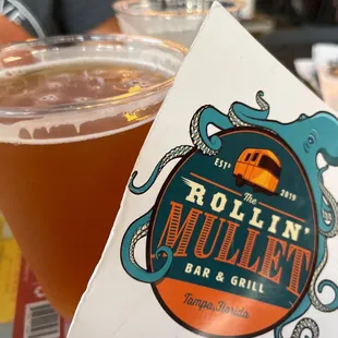 Draft beer and the menu logo.
