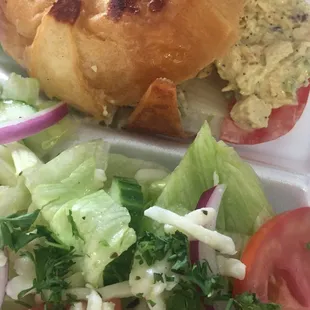 Chicken salad sandwich and a greek salad