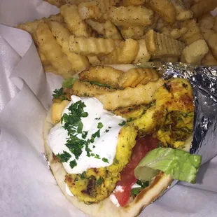 Chicken Gyro with a side Greek seasoned Fries