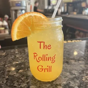 a mason jar filled with a drink